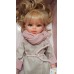 Papusa Sabrina blonda cu hainuta si fular roz 40 cm